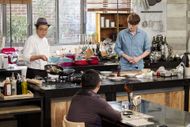 MCs of The Olive Show, a comedian Cho Se-ho and a singer Sung Si-kyung watch a chef Jin Kyung-soo cooks chop steak with his own fig sauce during The Olive Show recording in a studio on Sep. 16, 2015 in Seoul, South Korea | Image via: Getty